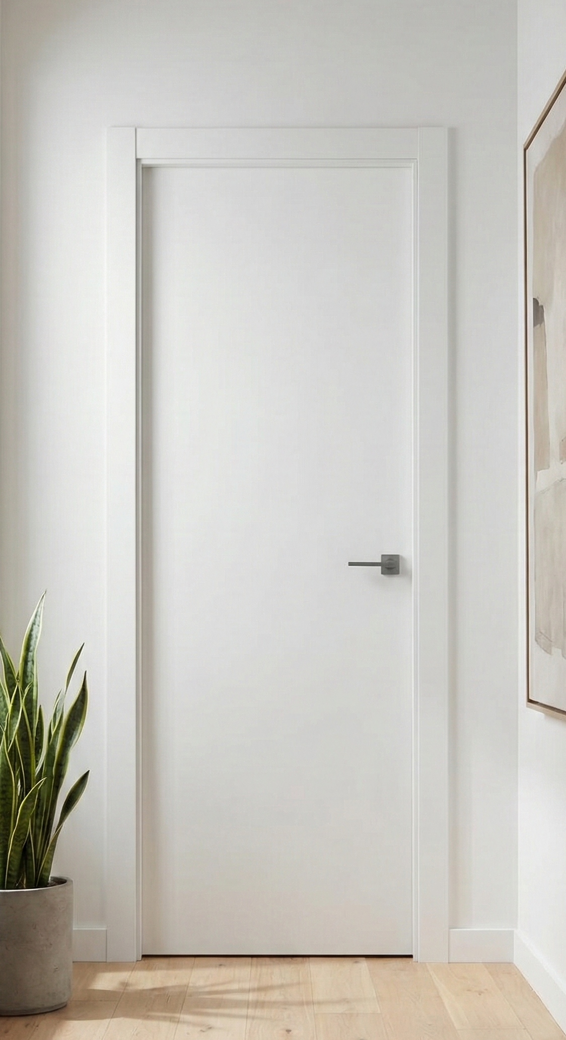 detalle de la puerta de entrada lisa lacada blanca